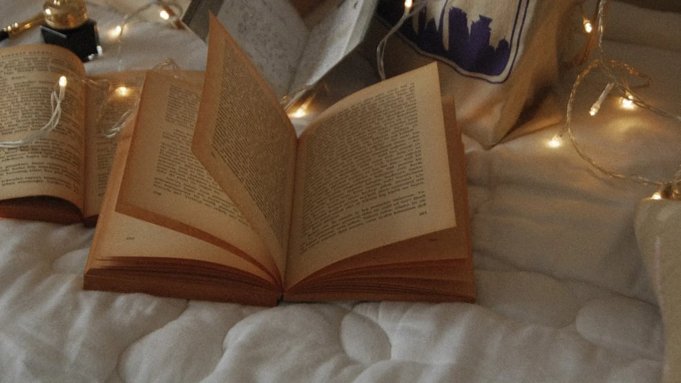 open-book-on-bed