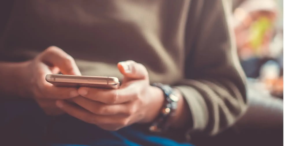 person-using-smartphone-to-disable-pop-up-blocker